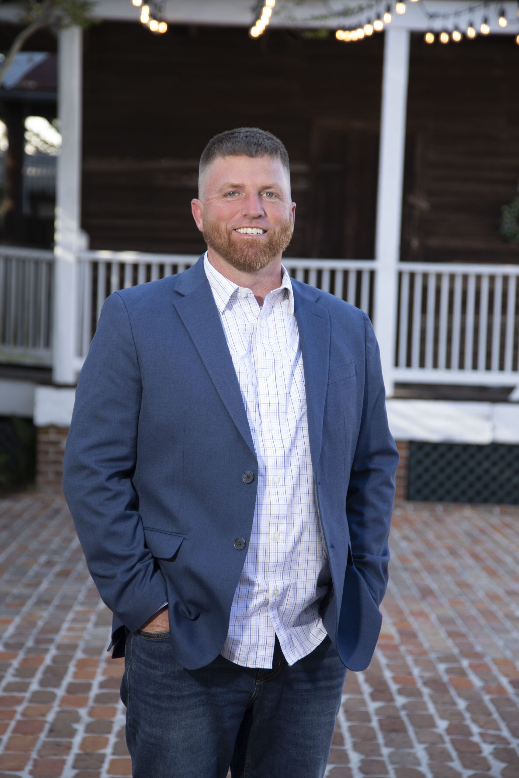 Headshot of GREG HILLENSBECK
